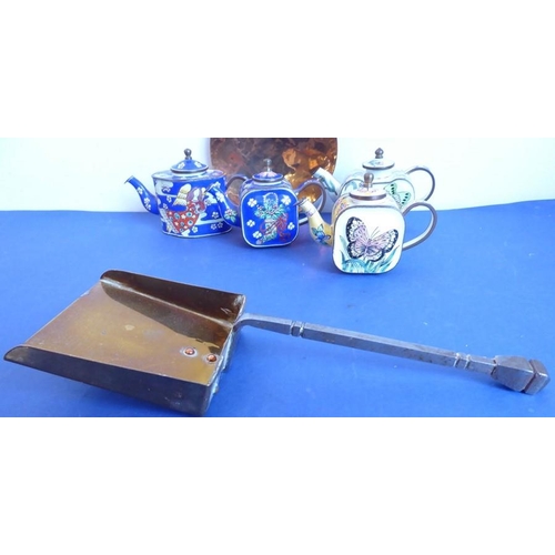 57 - Four miniature enamelled teapots (various); together with a small handmade brass shovel having a ste... 