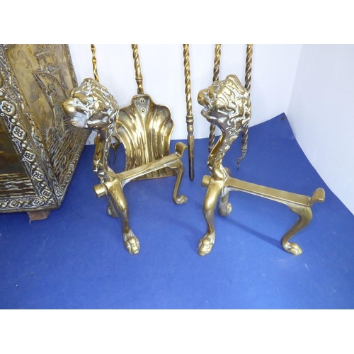 58 - Fireside brassware comprising a coal box, fire-irons and fire-dogs; the coal box decorated with gall... 