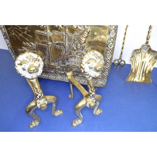 58 - Fireside brassware comprising a coal box, fire-irons and fire-dogs; the coal box decorated with gall... 