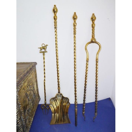 58 - Fireside brassware comprising a coal box, fire-irons and fire-dogs; the coal box decorated with gall... 
