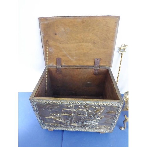 58 - Fireside brassware comprising a coal box, fire-irons and fire-dogs; the coal box decorated with gall... 