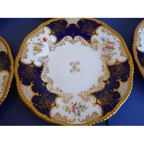 6 - A set of 12 early 20th century fine Coalport porcelain dessert plates; each with raised beaded gilde... 