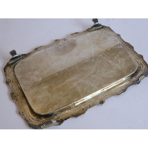 150 - An early 19th century oblong silver tray; raised gadrooned border with shell-style motifs, assay mar... 