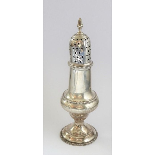 151 - An 18th century hallmarked silver baluster-shaped caster; having pierced domed cover, acorn-style fi... 