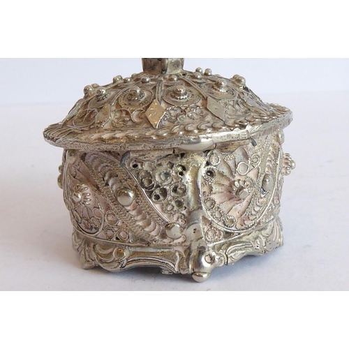 155 - A heavy cast circular silver metal coloured box and cover of Eastern inspiration (possibly Indian/Ir... 