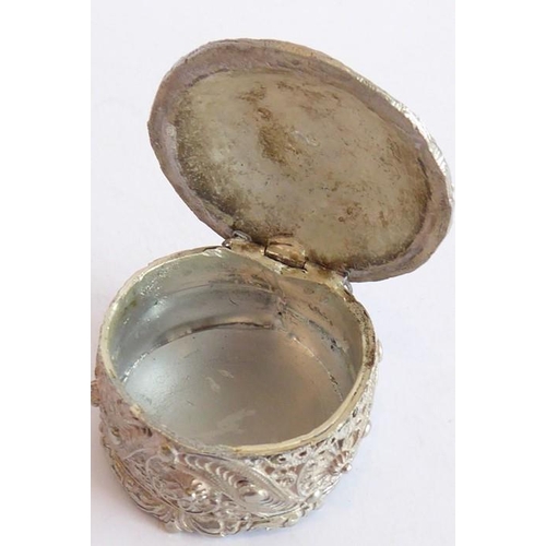 155 - A heavy cast circular silver metal coloured box and cover of Eastern inspiration (possibly Indian/Ir... 