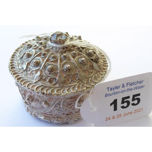 155 - A heavy cast circular silver metal coloured box and cover of Eastern inspiration (possibly Indian/Ir... 