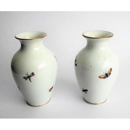 16 - A pair of Herend porcelain vases of baluster form; decorated with two songbirds and insects in fligh... 