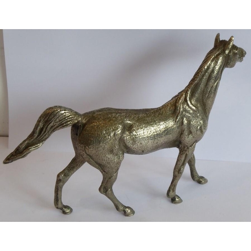 165 - A heavy early 20th century/Art Deco period cast silver-plated model of a stallion standing four squa... 