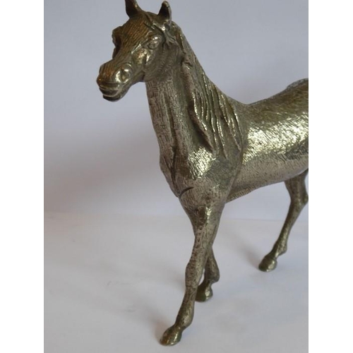 165 - A heavy early 20th century/Art Deco period cast silver-plated model of a stallion standing four squa... 