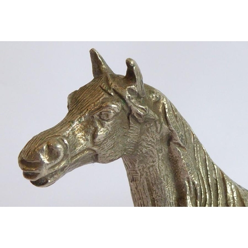 165 - A heavy early 20th century/Art Deco period cast silver-plated model of a stallion standing four squa... 