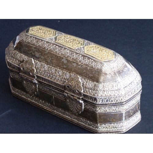 167 - A heavy Eastern white-metal box of octagonal form with straight sides; the top of the hinged lid set... 