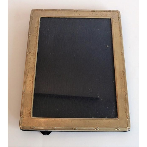 175 - A modern hallmarked silver photograph frame (21.5cm x 16.5cm)