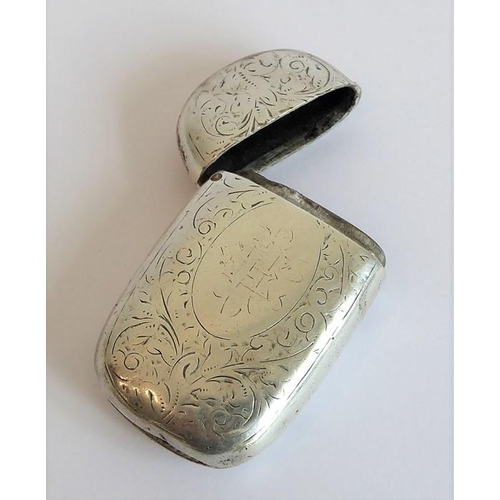 179 - Two hallmarked silver vesta cases, both engraved with foliate designs, together with a modern hallma... 