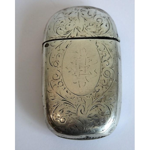 179 - Two hallmarked silver vesta cases, both engraved with foliate designs, together with a modern hallma... 