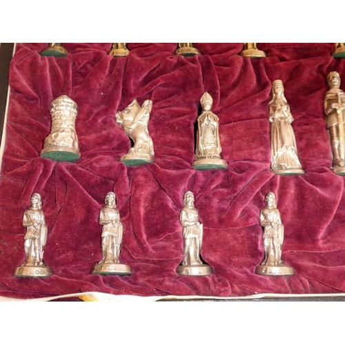 181 - A cased set of hallmarked solid silver chess pieces (natural silver and gilded); the kings 7.25cm hi... 