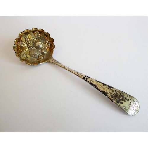 182 - An early 19th century hallmarked silver berry-spoon-type ladle with gilded interior bowl, together w... 