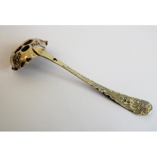 182 - An early 19th century hallmarked silver berry-spoon-type ladle with gilded interior bowl, together w... 