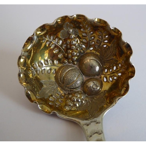 182 - An early 19th century hallmarked silver berry-spoon-type ladle with gilded interior bowl, together w... 