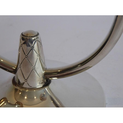 184 - A fine handmade candelabra in the modernist style (A. E Jones); hallmarked for Birmingham 1970 with ... 