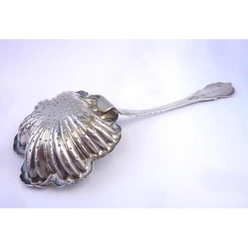 185 - A Russian silver tea strainer, dated 1854