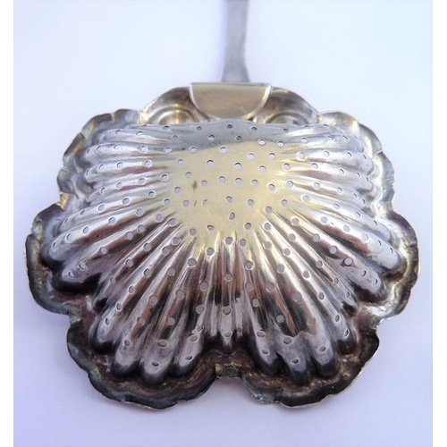 185 - A Russian silver tea strainer, dated 1854