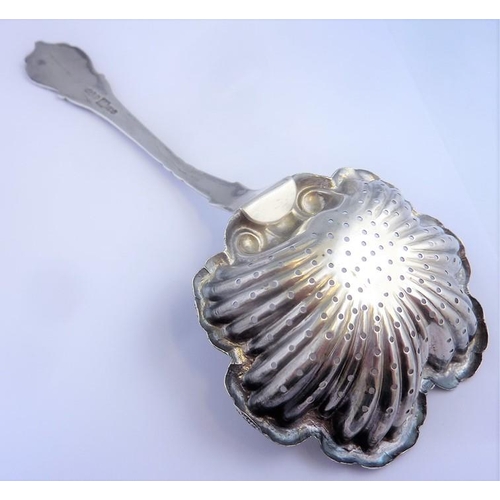 185 - A Russian silver tea strainer, dated 1854