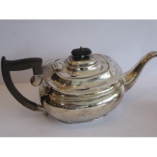 192 - A heavy hallmarked silver three-piece tea service: teapot, two-handled sugar and milk jug; maker's m... 