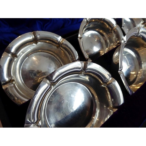 195 - A fine set of six hallmarked silver bowls; crimped edges, retailer's mark of 'Arnold & Lewis, Manche... 