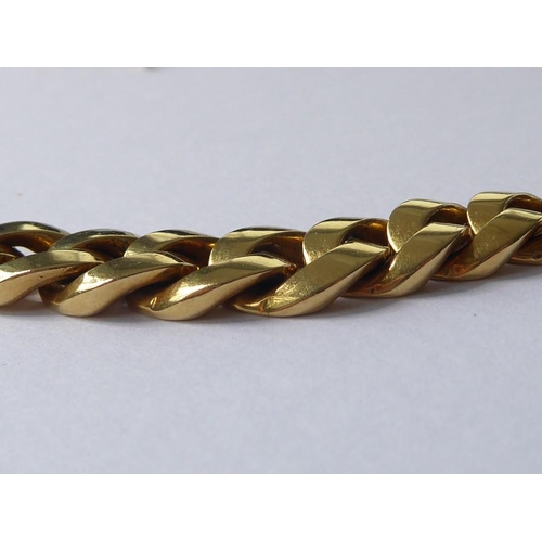 204 - An 18-carat yellow-gold graduated flexible link necklace; of faceted entrelac design, the concealed ... 