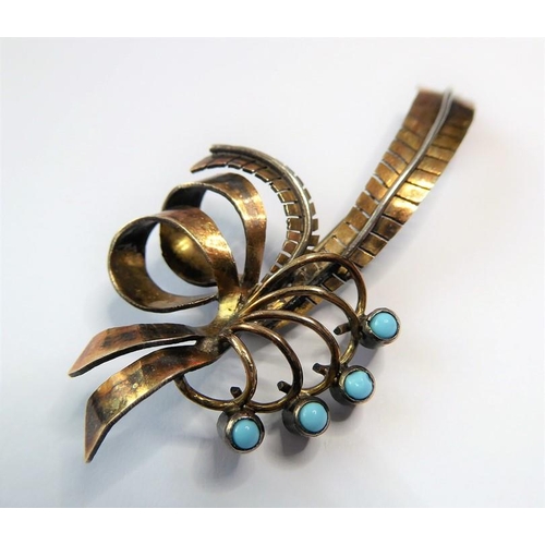 211 - A mid 20th century two coloured spray brooch set with four turquoise collets (one a/f) (length 6cm, ... 