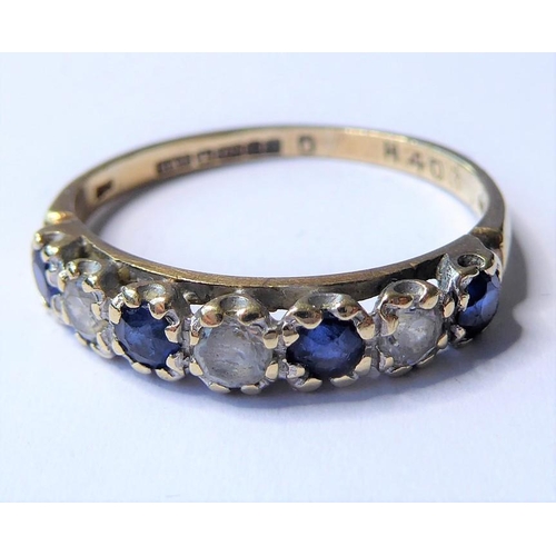 212 - A sapphire and white sapphire half hoop ring, the four circular-cut sapphires each separated by a wh... 