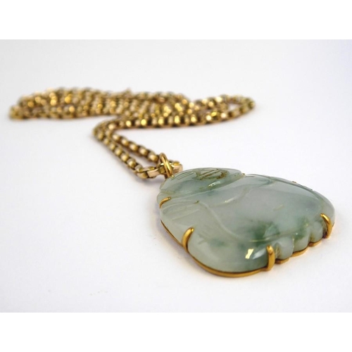 217 - A jadeite pendant of a seated buddha suspended from a oval belcher link chain necklace (weight 7.8g)