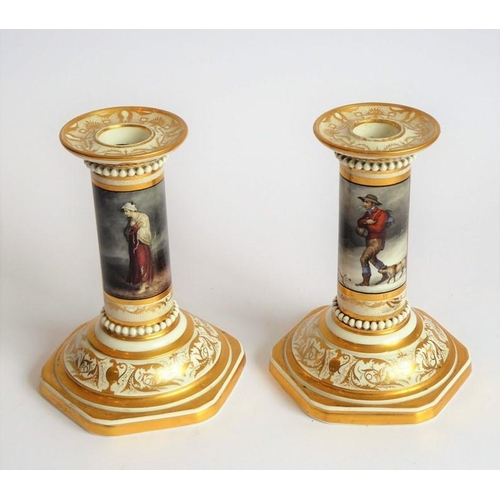 23 - An interesting pair of Barr, Flight & Barr (Royal Porcelain Works, Worcester) porcelain candlesticks... 