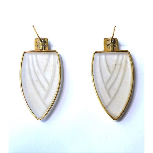 232 - A pair of frosted glass and diamond-set ear pendants, each designed as a moulded shield to the four ... 