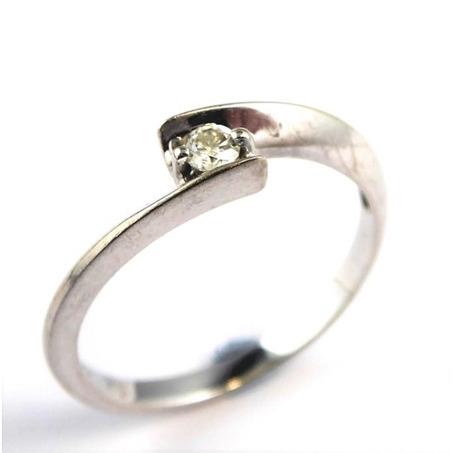 248 - A solitaire diamond ring, the stone set in a white gold ring marked 10K (total weight 1.6g, diamond ... 