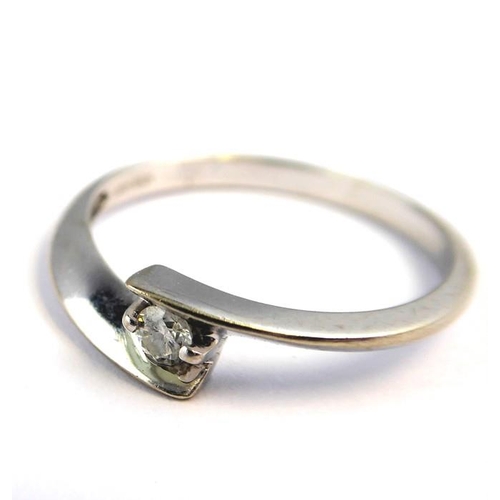 248 - A solitaire diamond ring, the stone set in a white gold ring marked 10K (total weight 1.6g, diamond ... 