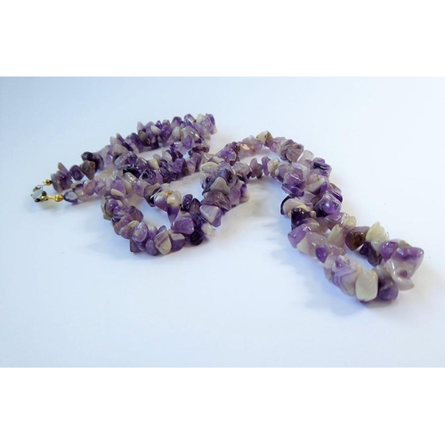 253 - Assorted jewellery: a tumbled amethyst nugget necklace and a branch coral necklace; three pairs of p... 