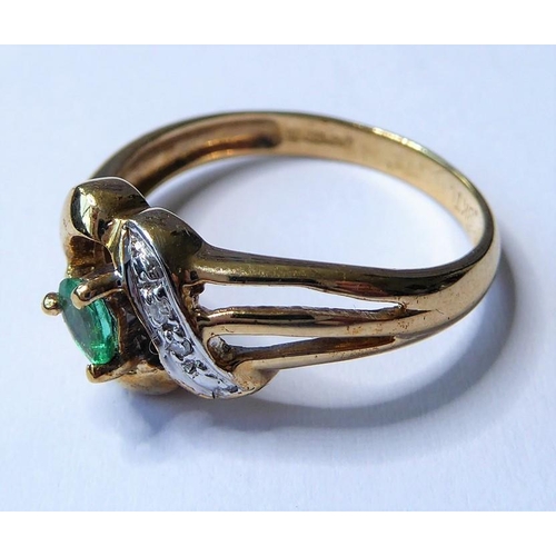 254 - An emerald and diamond-set ring, the pear-shaped emerald claw-set above an openwork setting with sin... 