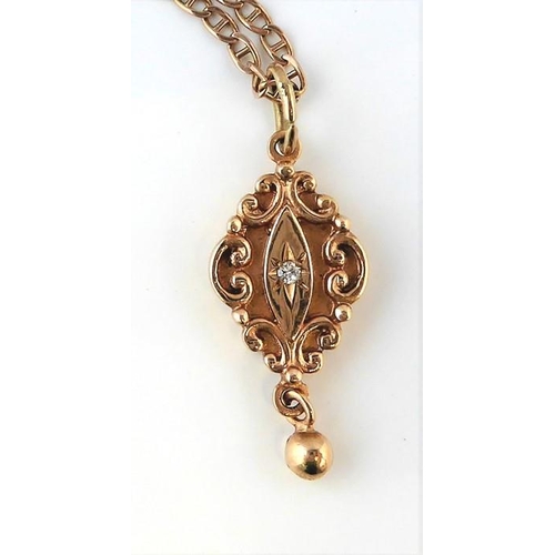 260 - A gold and diamond pendant with a 9-carat gold chain (weight 6.3g)