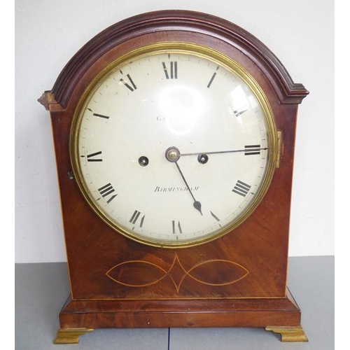 264 - A 19th century mahogany and boxwood-strung eight-day bracket clock; the oval hinged gilt-metal handl... 