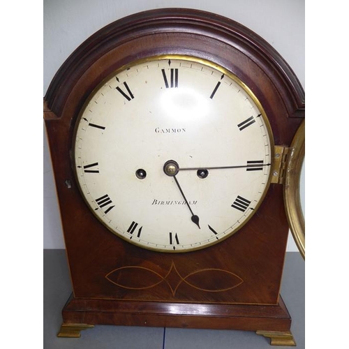 264 - A 19th century mahogany and boxwood-strung eight-day bracket clock; the oval hinged gilt-metal handl... 