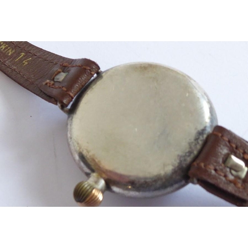 270 - An early 20th century gentleman's wristwatch; silver-coloured metal case, black dial signed 'Birch &... 