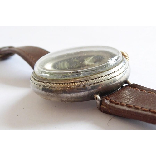 270 - An early 20th century gentleman's wristwatch; silver-coloured metal case, black dial signed 'Birch &... 