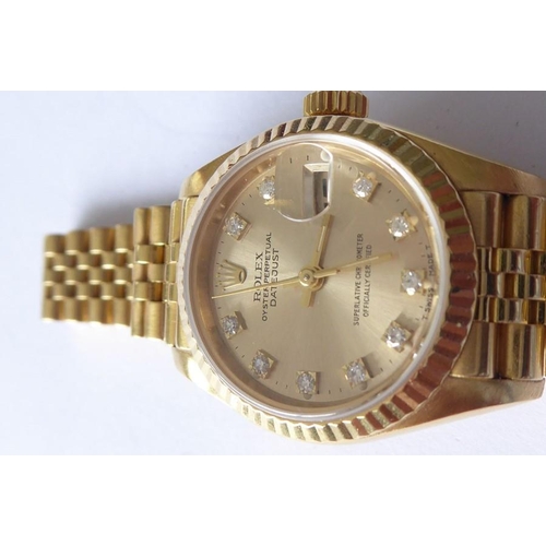 283A - A lady's 18 carat yellow gold and diamond-set Oyster Perpetual Datejust Chronometer by Rolex,  the s... 