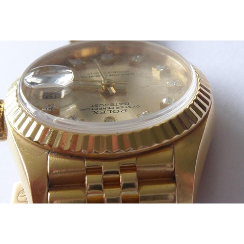 283A - A lady's 18 carat yellow gold and diamond-set Oyster Perpetual Datejust Chronometer by Rolex,  the s... 