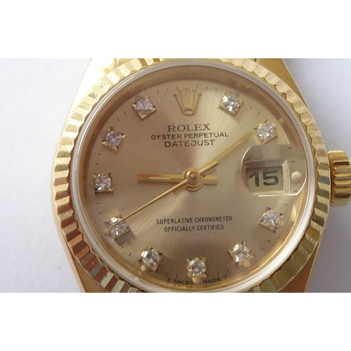 283A - A lady's 18 carat yellow gold and diamond-set Oyster Perpetual Datejust Chronometer by Rolex,  the s... 