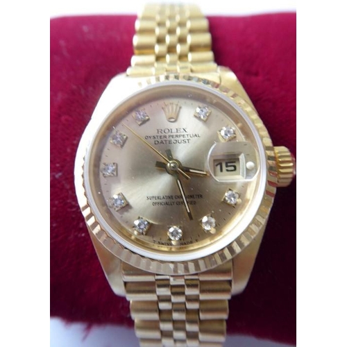 283A - A lady's 18 carat yellow gold and diamond-set Oyster Perpetual Datejust Chronometer by Rolex,  the s... 