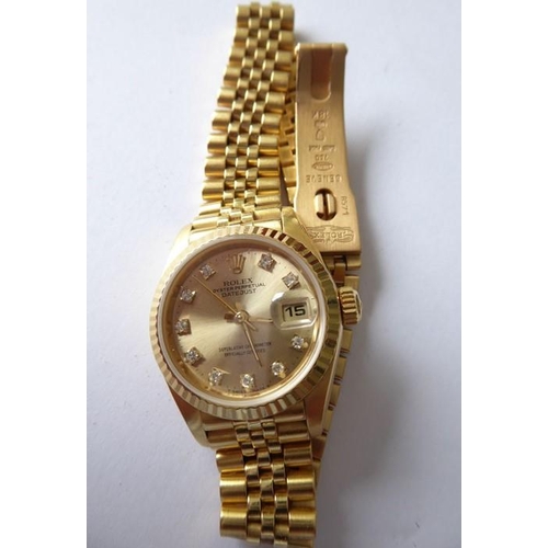 283A - A lady's 18 carat yellow gold and diamond-set Oyster Perpetual Datejust Chronometer by Rolex,  the s... 