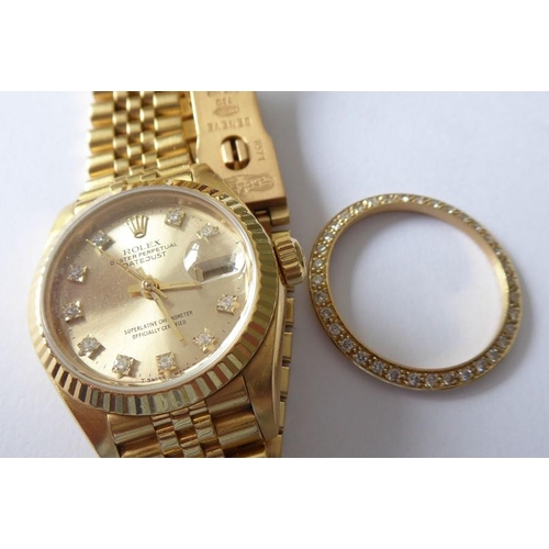 283A - A lady's 18 carat yellow gold and diamond-set Oyster Perpetual Datejust Chronometer by Rolex,  the s... 